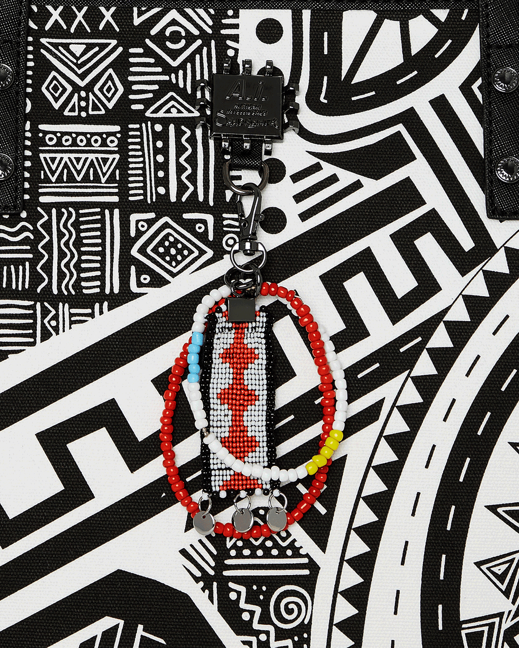 A.I. AFRICAN INTELLIGENCE THE SKYHAWK WING TOTE - SANDFLOWER COLLAB